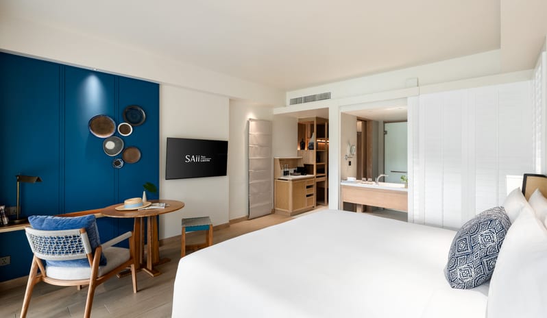 SAii Laguna Phuket Lagoon View Terrace King Bed Table and TV